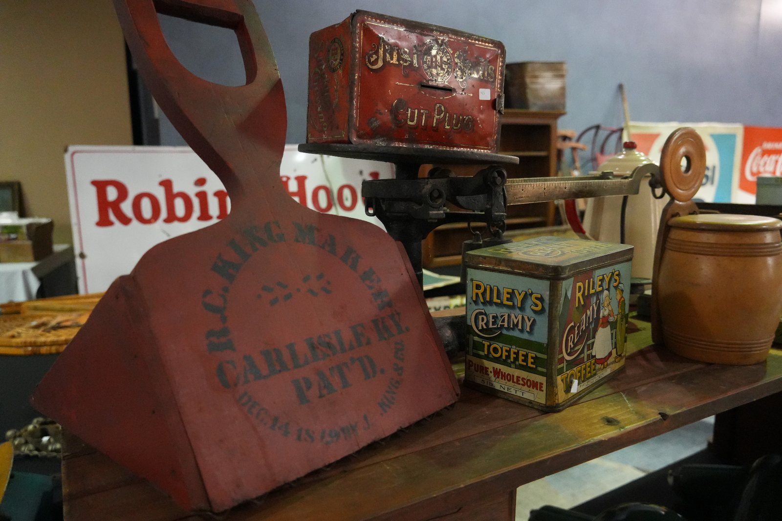 Vintage tins, stoneware and a cranberry scoop